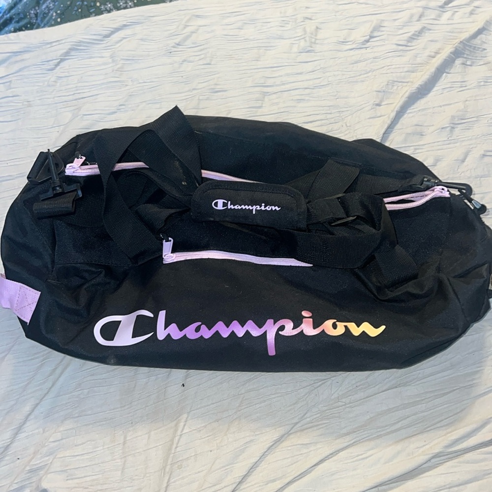 Never used champion bag, pink and yellow, medium size